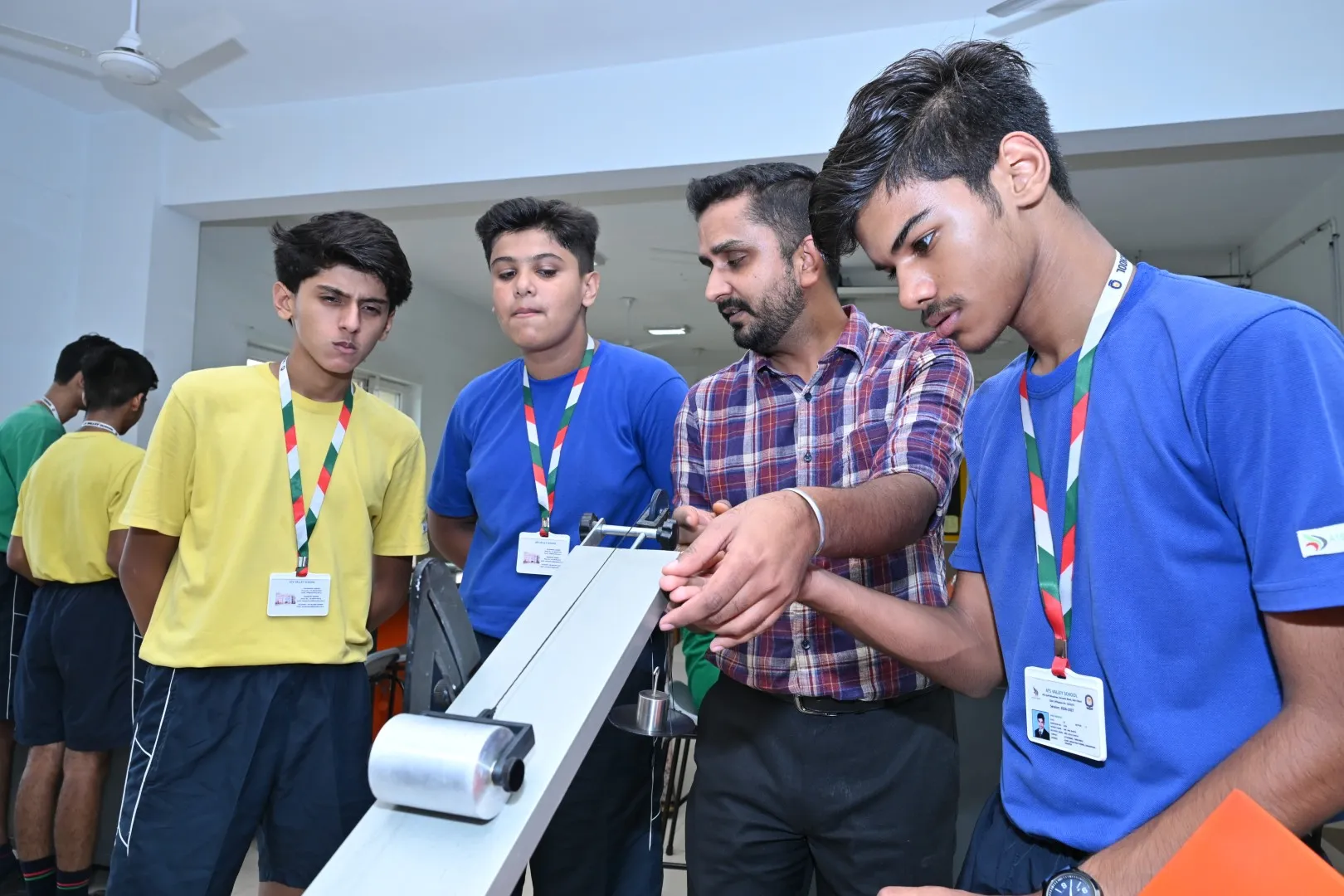 Students working with robotics at ATS Valley School