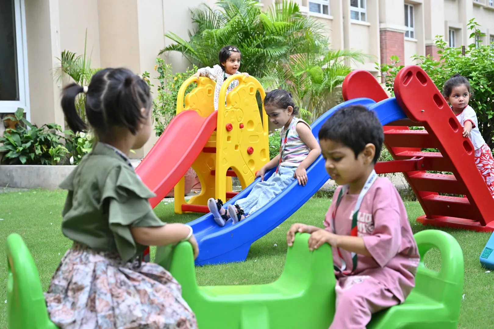 Children exploring a colourful learning environment
